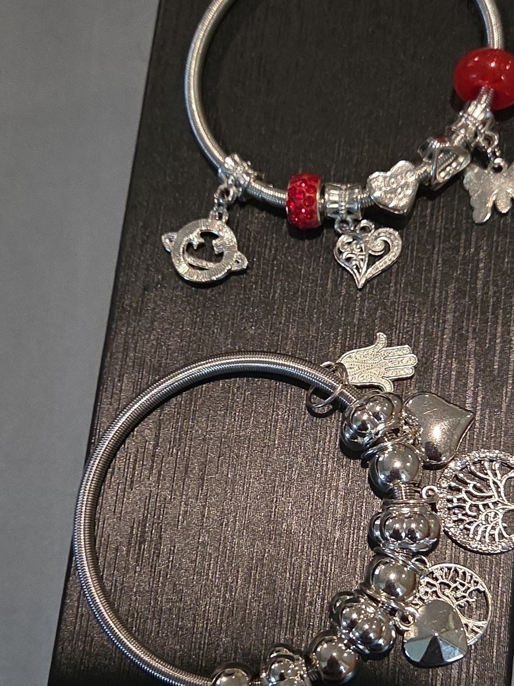 Silver Tone Charm Bangle Bracelet with Red Accent